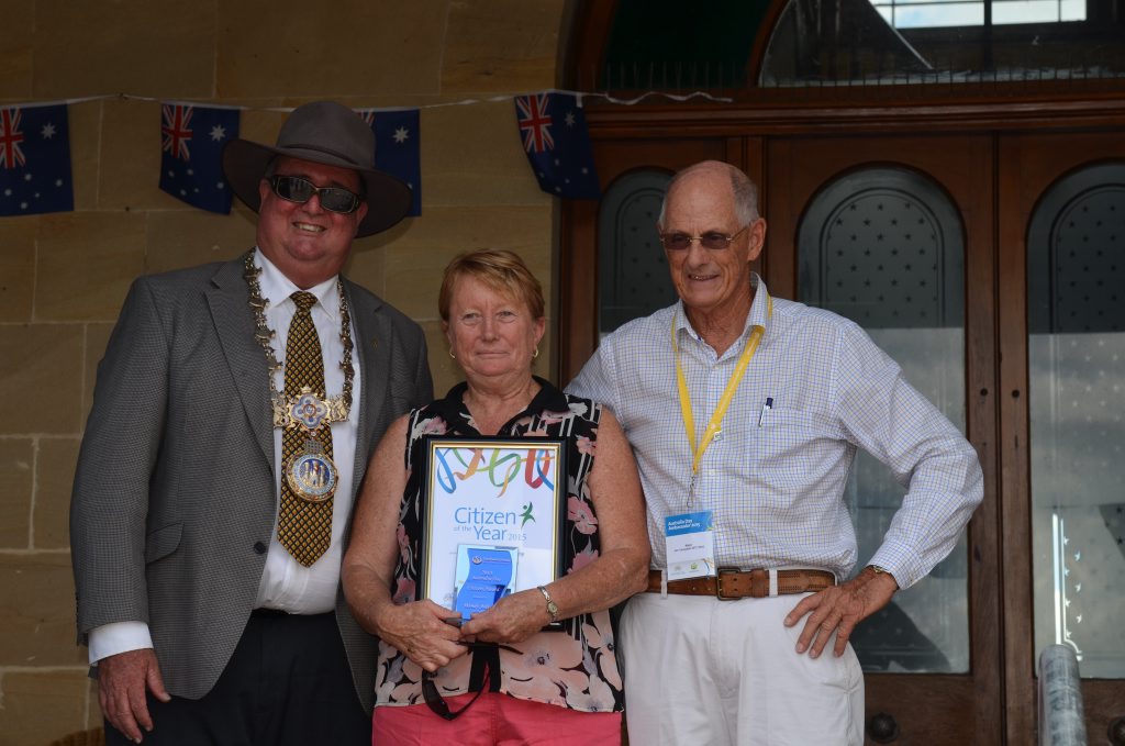 2015 Southern Downs Regional Citizen of the Year Wendy Ardrey (middle) is presented with her award by Southern Downs Mayor Peter Blundell and Major Jim Campbell.